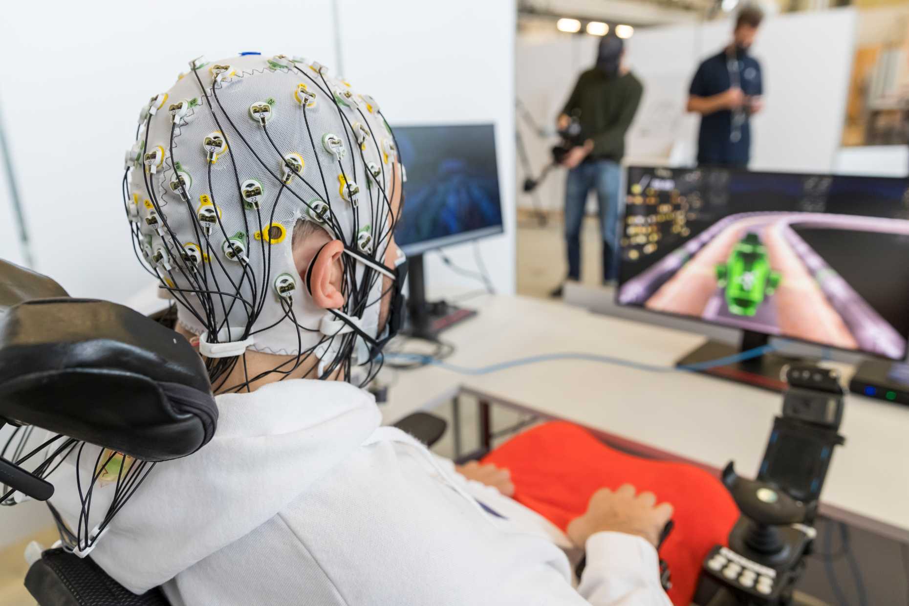 CYBATHLON pilot Samuel Kunz steering a car in a virtual race by only using his thoughts. (ETH/Alessandro Della Bella)
